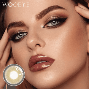 The girl's face is looking straight ahead, the upper left is the Wooeye logo, and the lower left is a close-up of the himaiay gray contact lens