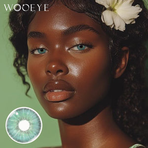 black model wearing Transform Green Contact Lenses