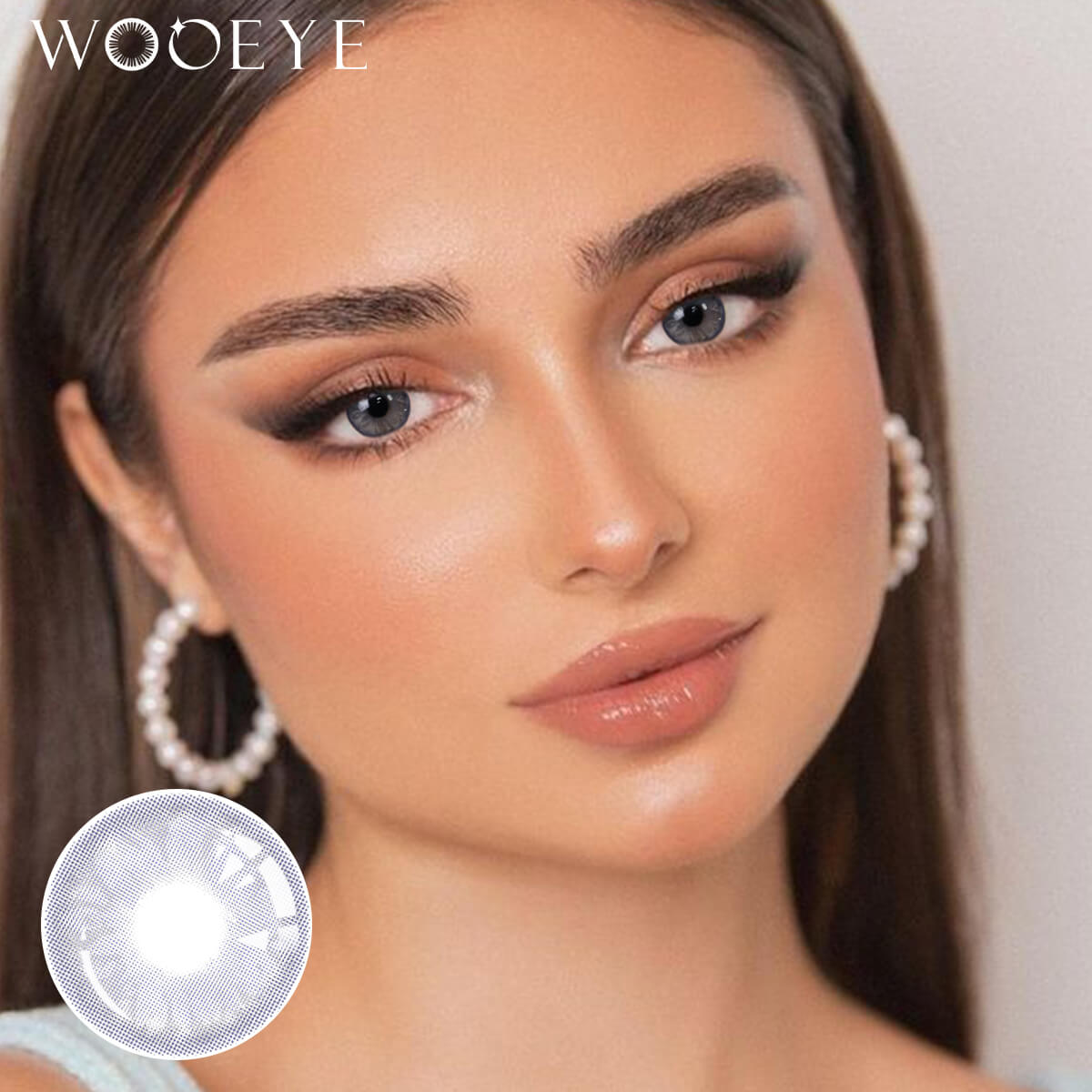 The girl's face is looking straight ahead, the upper left is the Wooeye logo, and the lower left is a close-up of the Banshe Blue contact lens