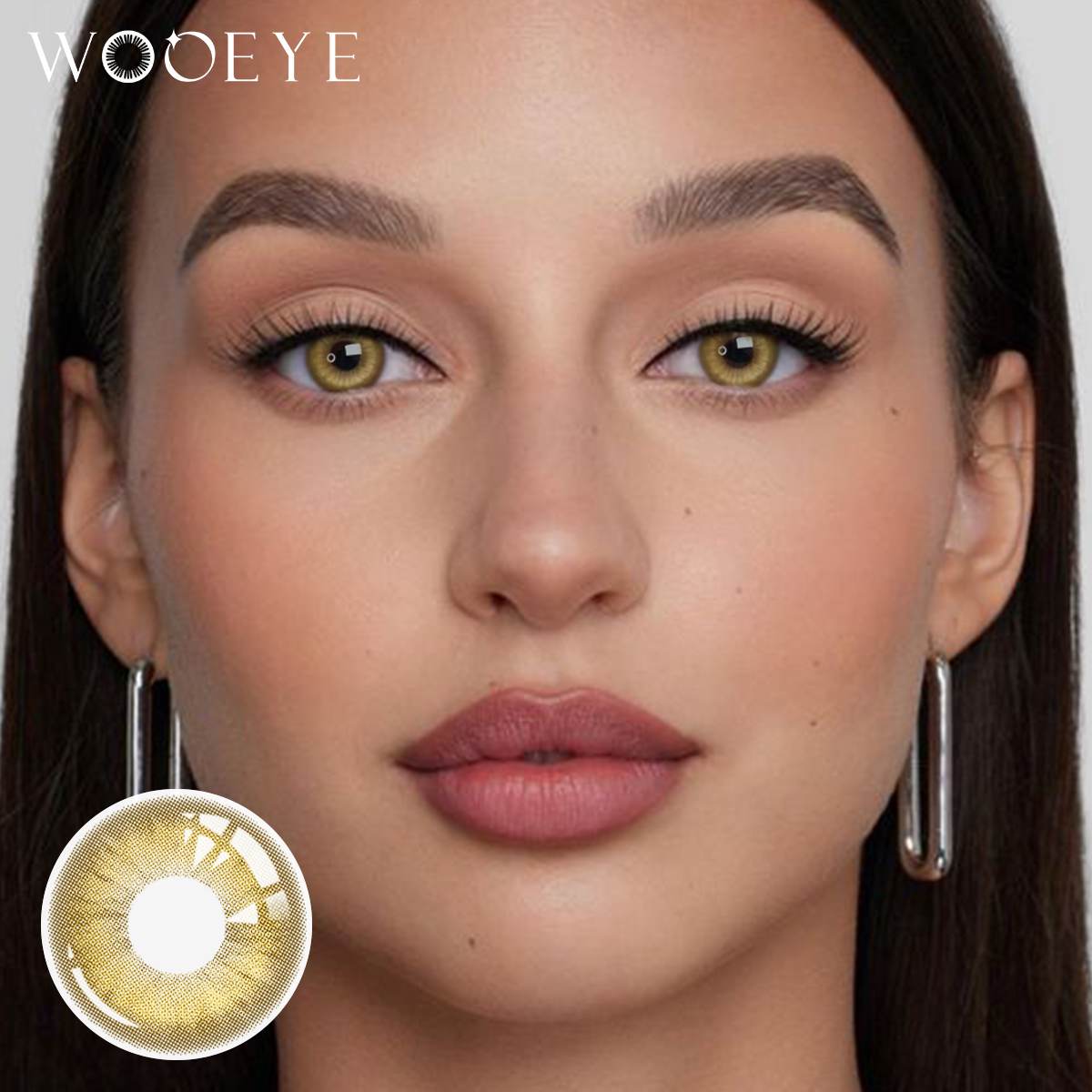 The girl's face is looking straight ahead, the upper left is the Wooeye logo, and the lower left is a close-up of the amber brown contact lens