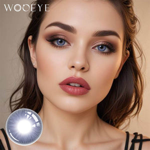 The girl's face is looking straight ahead, the upper left is the Wooeye logo, and the lower left is a close-up of the nut blue contact lens