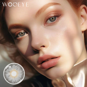 The girl's face is looking straight ahead, the upper left is the Wooeye logo, and the lower left is a close-up of the Mermaid Grey contact lens