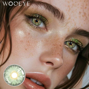 The girl's face is looking straight ahead, the upper left is the Wooeye logo, and the lower left is a close-up of the Mermaid Green contact lens