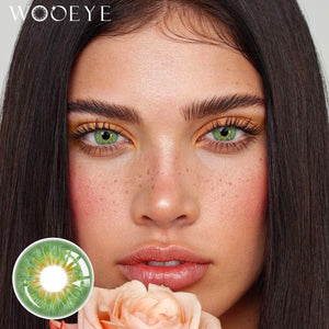 The girl's face is looking straight ahead, the upper left is the Wooeye logo, and the lower left is a close-up of the Vegas Green contact lens