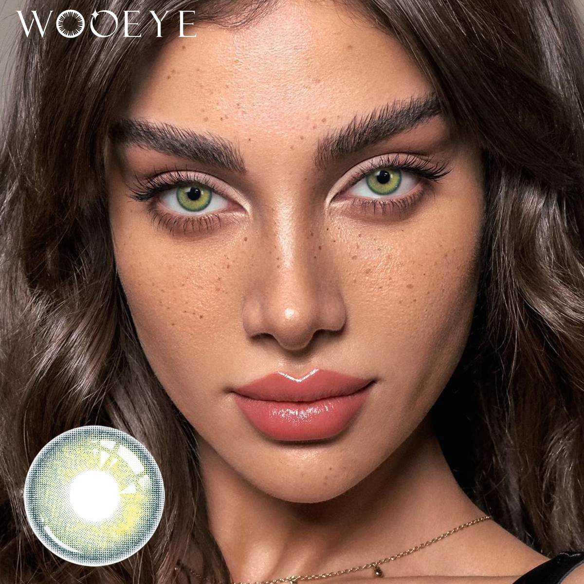 The girl's face is looking straight ahead, the upper left is the Wooeye logo, and the lower left is a close-up of the Petal Blue contact lens