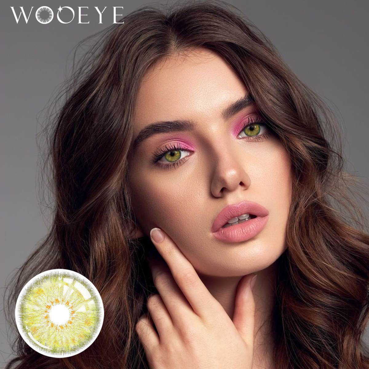 The girl's face is looking straight ahead, the upper left is the Wooeye logo, and the lower left is a close-up of the Petal Green contact lens