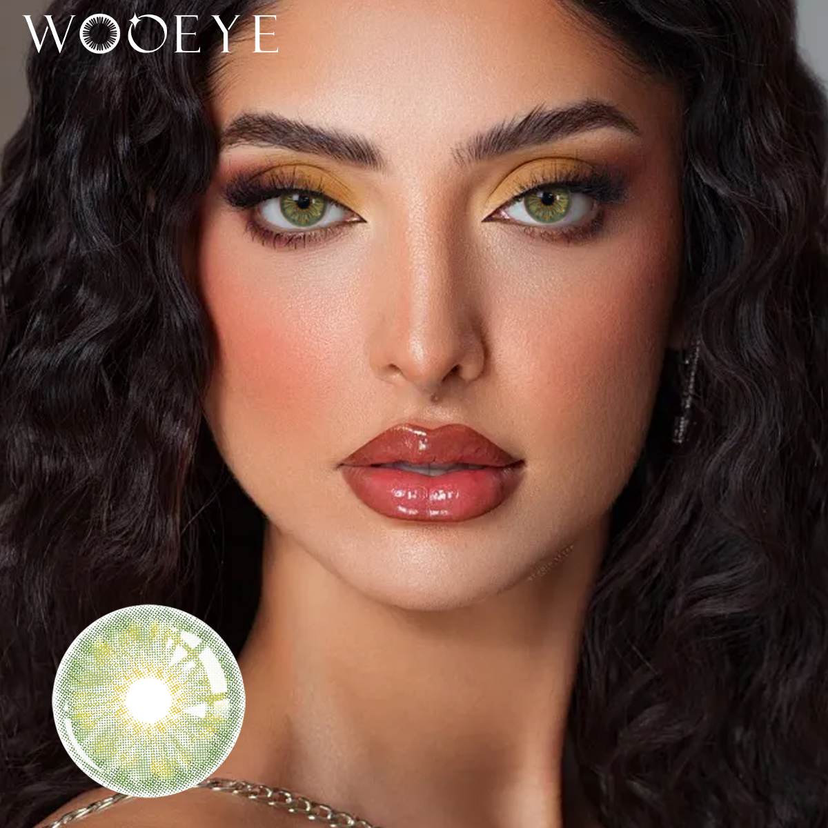 The girl's face is looking straight ahead, the upper left is the Wooeye logo, and the lower left is a close-up of the Breeze Hazel Green contact lens