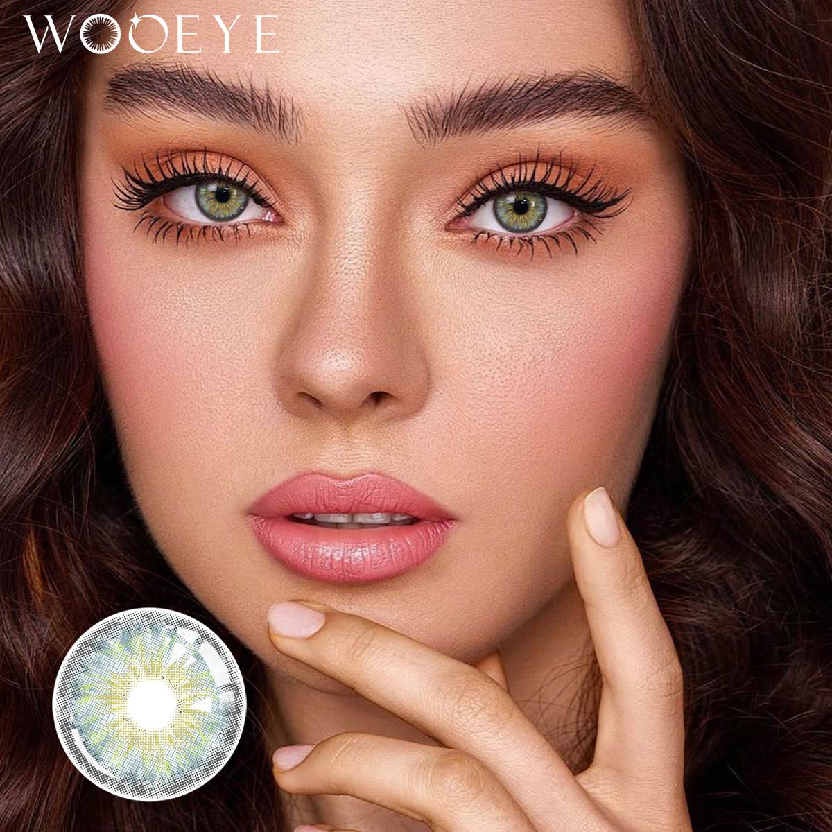 The girl's face is looking straight ahead, the upper left is the Wooeye logo, and the lower left is a close-up of the Thorn Blue contact lens