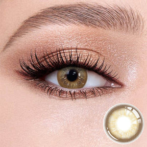 Cape Cod Brown contact lenses on the eyes, close-up of the product on the lower right
