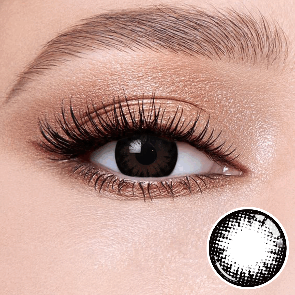 Pearl Black contact lenses on the eyes, close-up of the product on the lower right