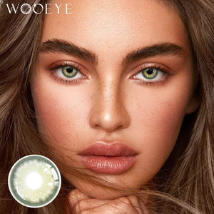 The girl's face is looking straight ahead, the upper left is the Wooeye logo, and the lower left is a close-up of the Sequoia Green contact lens