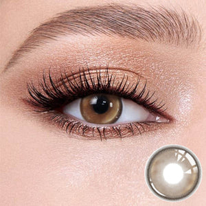 Natural looking Master Tea Brown contact lense with soft limbal ring for dark eyes