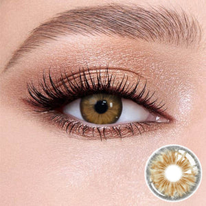 Cleo Hazel Brown contact lenses on the eyes, close-up of the product on the lower right