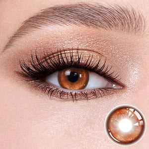 Thermo Aura Brown contact lenses on the eyes, close-up of the product on the lower right