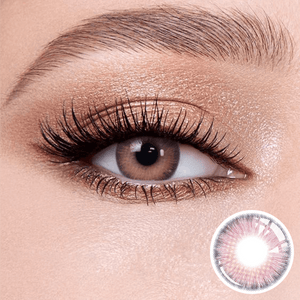 Romantic Purple contact lenses on the eyes, close-up of the product on the lower right