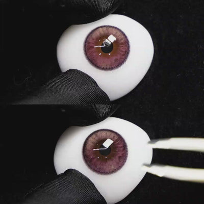 A simulated brown prosthetic eye showing the visual transformation effect of wearing Wooeye Plato Purple colored contact lenses against a black background.
