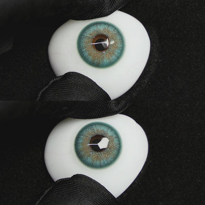 Star Green contact lenses on a brown simulated eyeball with a black background.