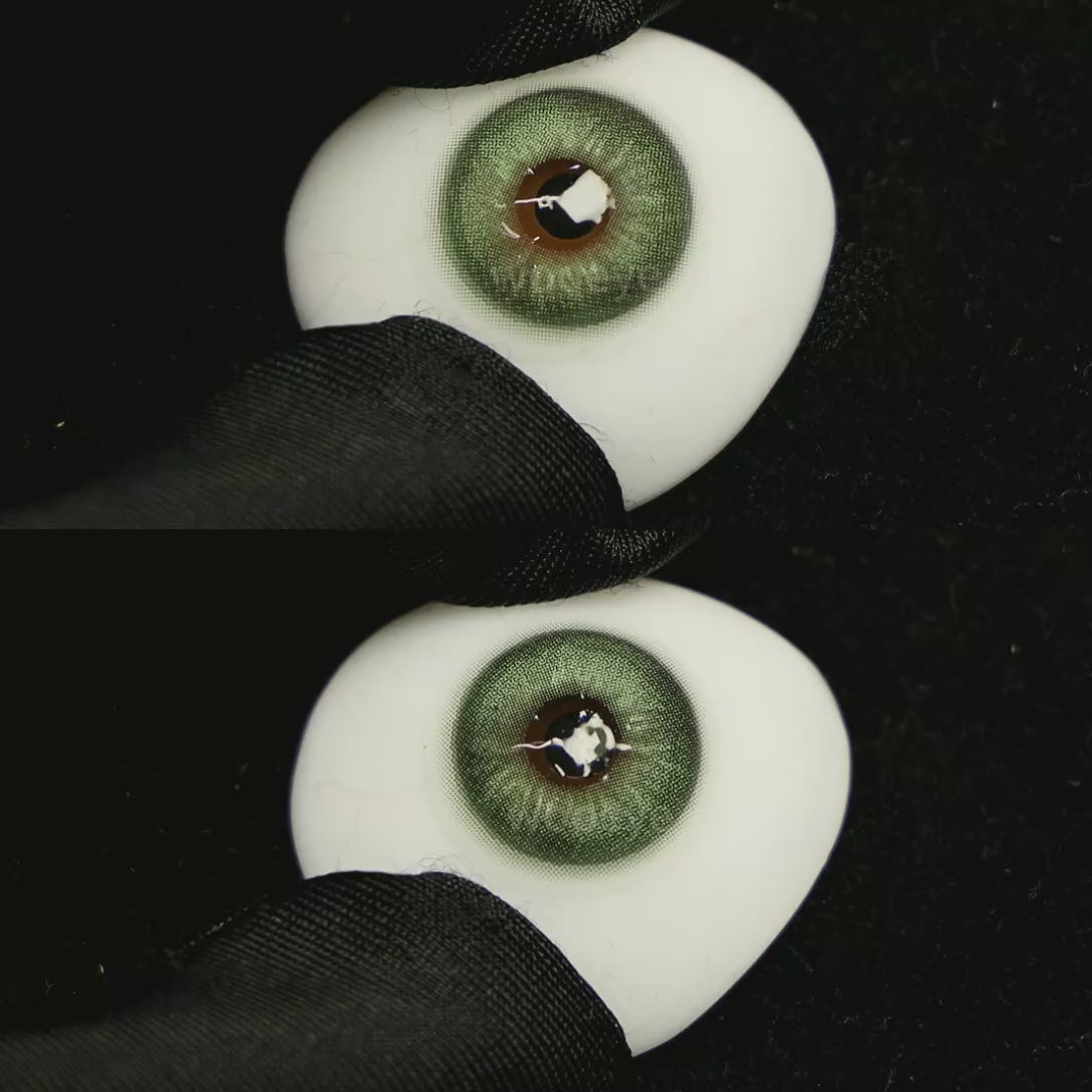 A simulated brown prosthetic eye showing the visual transformation effect of wearing Honeycomb Green colored contact lenses against a black background.