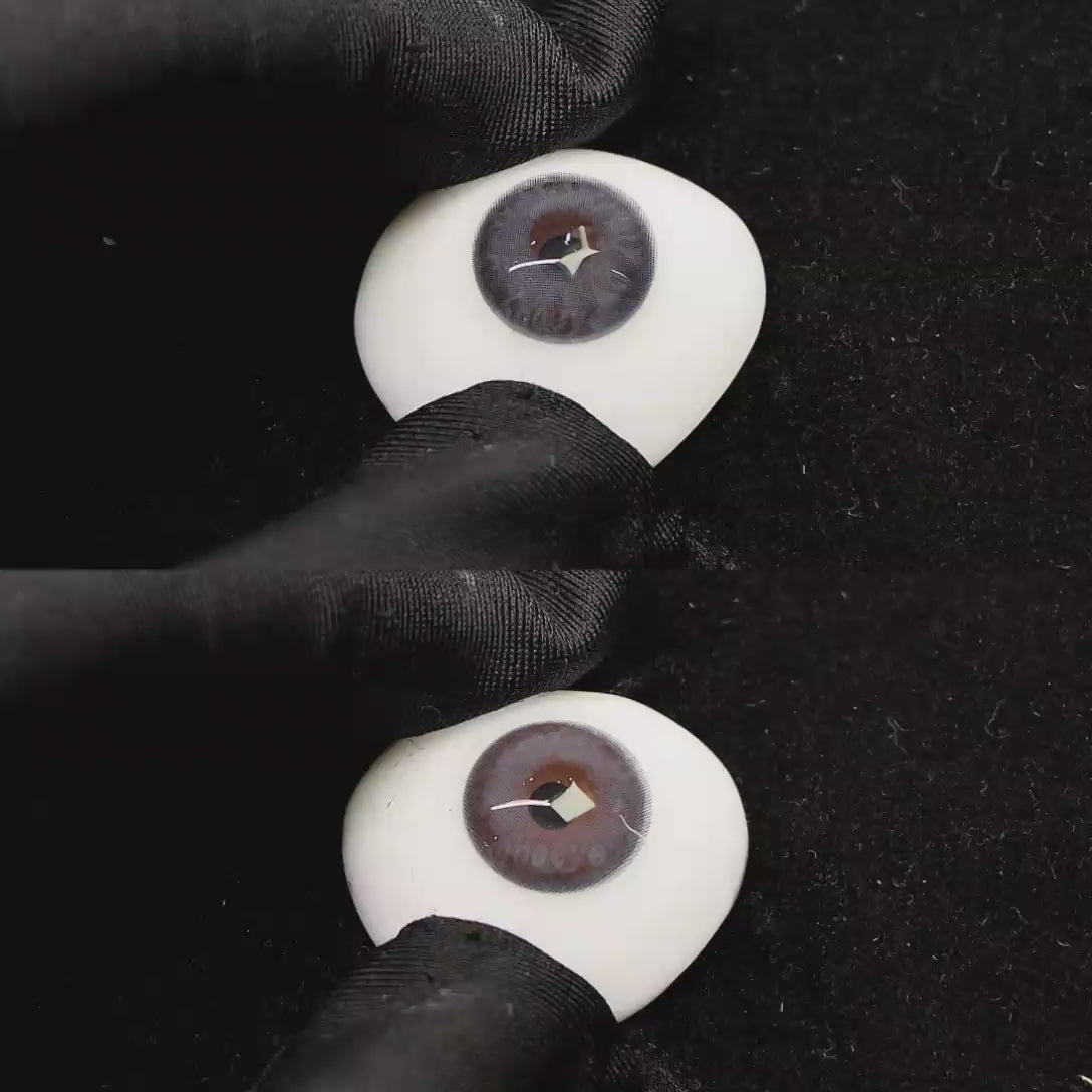 A simulated brown prosthetic eye showing the visual transformation effect of wearing banshe light blue colored contact lenses against a black background.