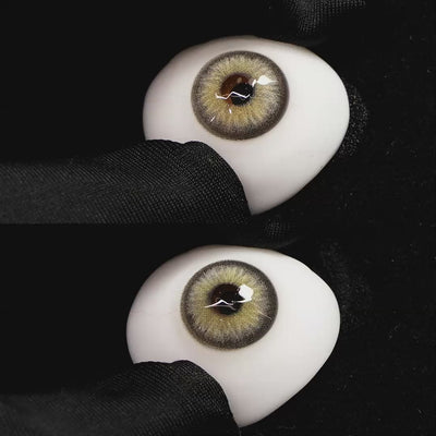 Diamond Brown II contact lenses on a brown simulated eyeball with a black background