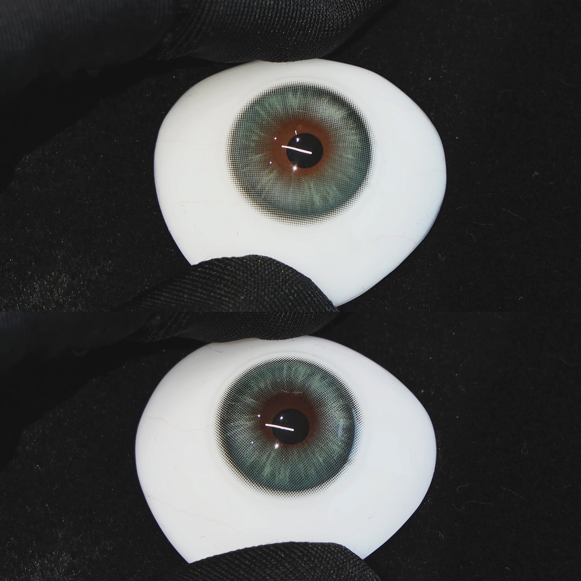 Mystery Green contact lenses on a brown simulated eyeball with a black background