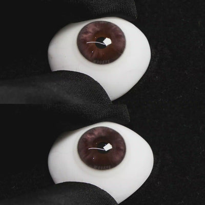 A simulated brown prosthetic eye showing the visual transformation effect of wearing Wooeye Peach Brown colored contact lenses against a black background.