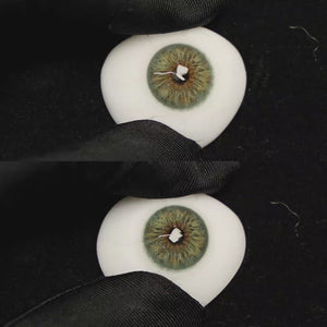 A simulated brown prosthetic eye showing the visual transformation effect of wearing Breeze Hazel Green colored contact lenses against a black background.