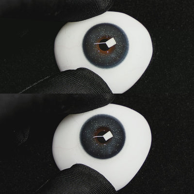 Wooeye Star Blue Contact Lenses on a brown simulated eyeball with a black background