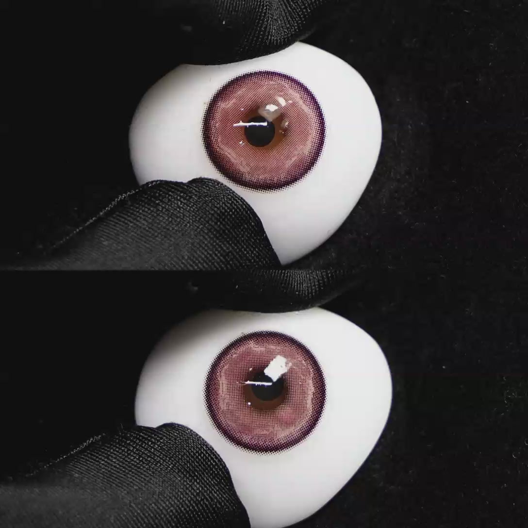 A simulated brown prosthetic eye showing the visual transformation effect of wearing Wooeye Heaven Purple colored contact lenses against a black background.