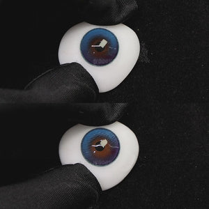 A simulated brown prosthetic eye showing the visual transformation effect of wearing aura blue colored contact lenses against a black background.