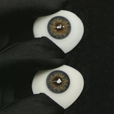 A simulated brown prosthetic eye showing the visual transformation effect of wearing Dancer Deep Blue colored contact lenses against a black background.