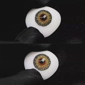 A simulated brown prosthetic eye showing the visual transformation effect of wearing Wooeye Desert Dreams Brown colored contact lenses against a black background.