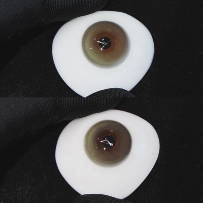 Master Green contact lenses on a brown simulated eyeball with a black background