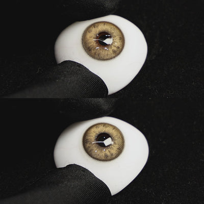 A simulated brown prosthetic eye showing the visual transformation effect of wearing Beverly Brown colored contact lenses against a black background.
