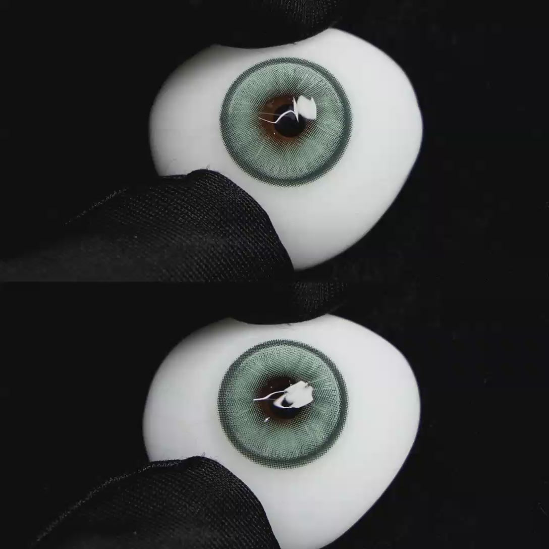 A simulated brown prosthetic eye showing the visual transformation effect of wearing Wooeye Boston Green colored contact lenses against a black background.