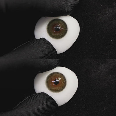 A simulated brown prosthetic eye showing the visual transformation effect of wearing diamond brown colored contact lenses against a black background.