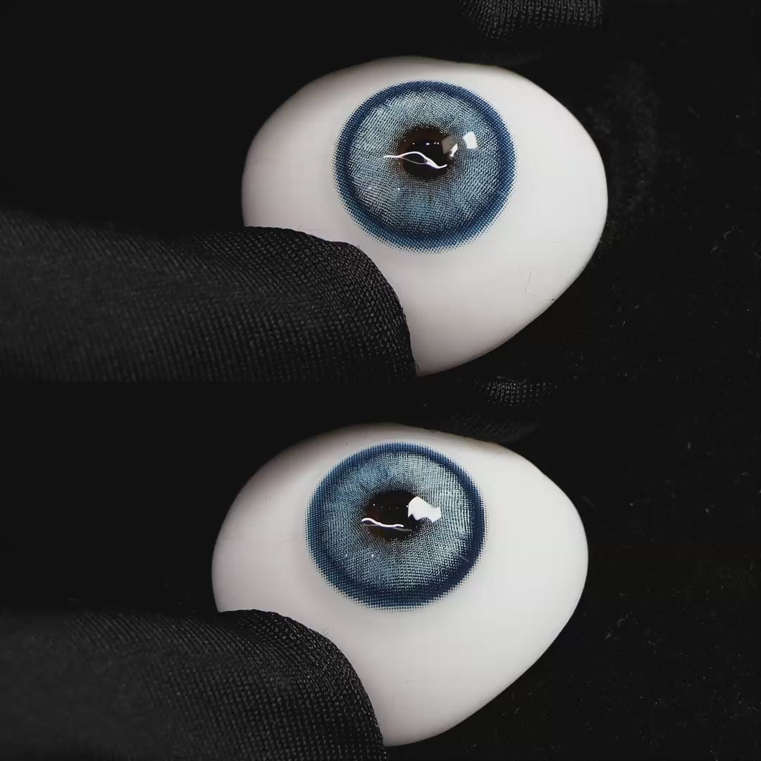 Diamond Blue I contact lenses on a brown simulated eyeball with a black background
