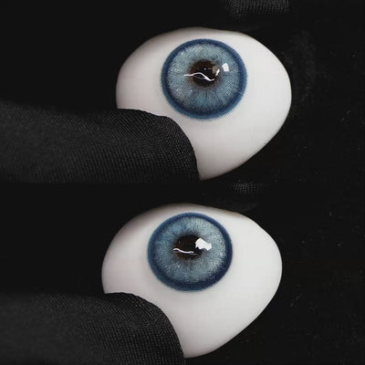 Diamond Blue I contact lenses on a brown simulated eyeball with a black background