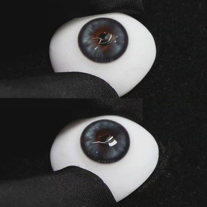 A simulated brown prosthetic eye showing the visual transformation effect of wearing Wooeye Peach Blue colored contact lenses against a black background.
