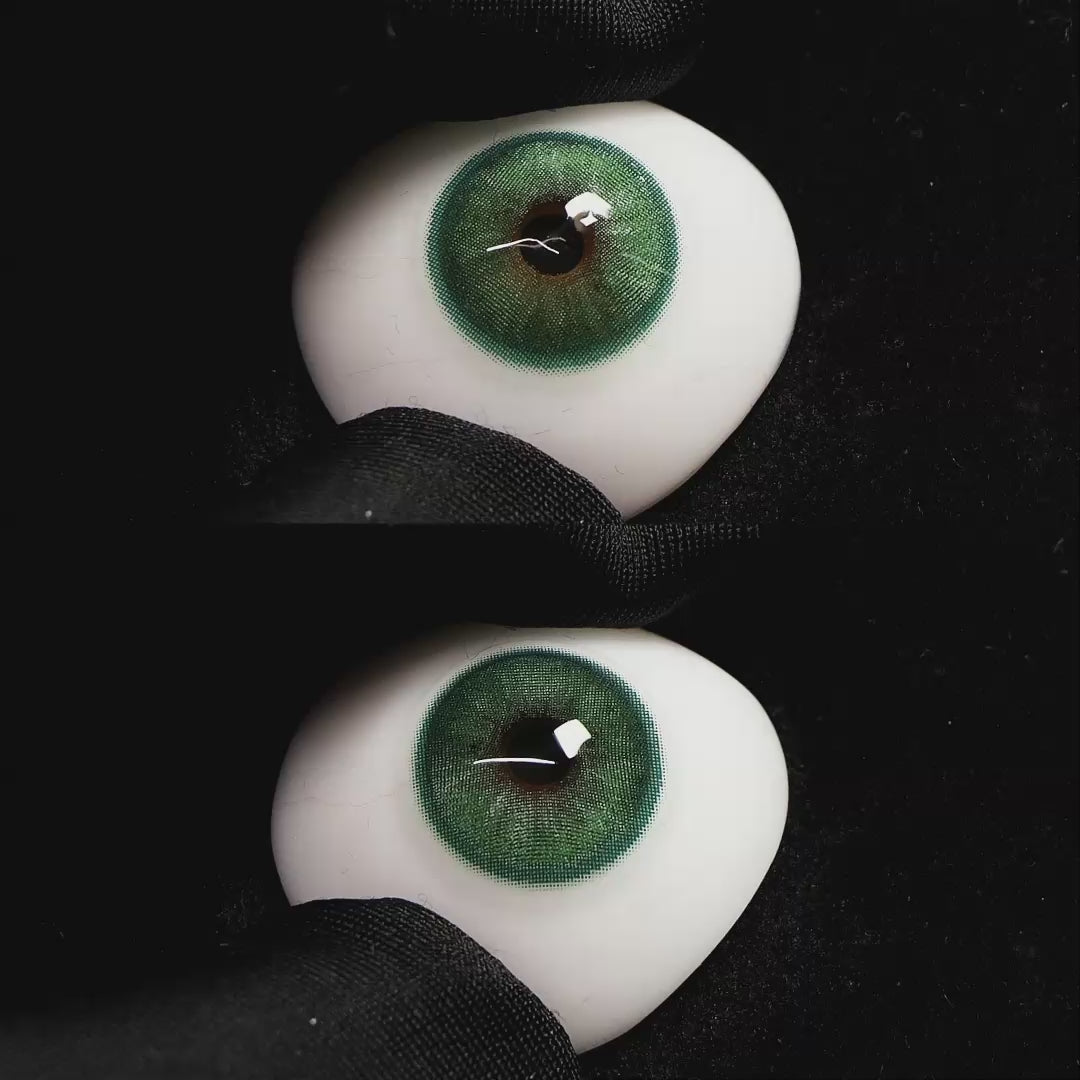 Diamond Green I contact lenses on a brown simulated eyeball with a black background