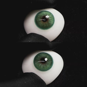 Diamond Green I contact lenses on a brown simulated eyeball with a black background