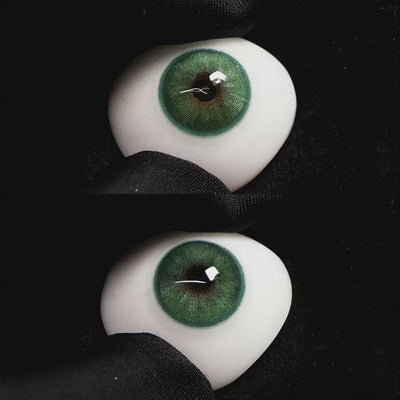 Diamond Green I contact lenses on a brown simulated eyeball with a black background