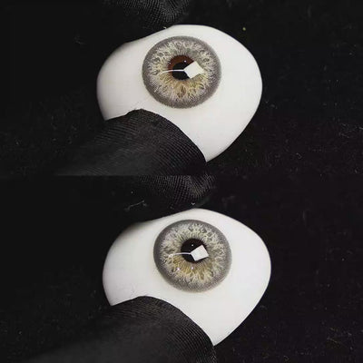 A simulated brown prosthetic eye showing the visual transformation effect of wearing Sequoia Blue colored contact lenses against a black background.