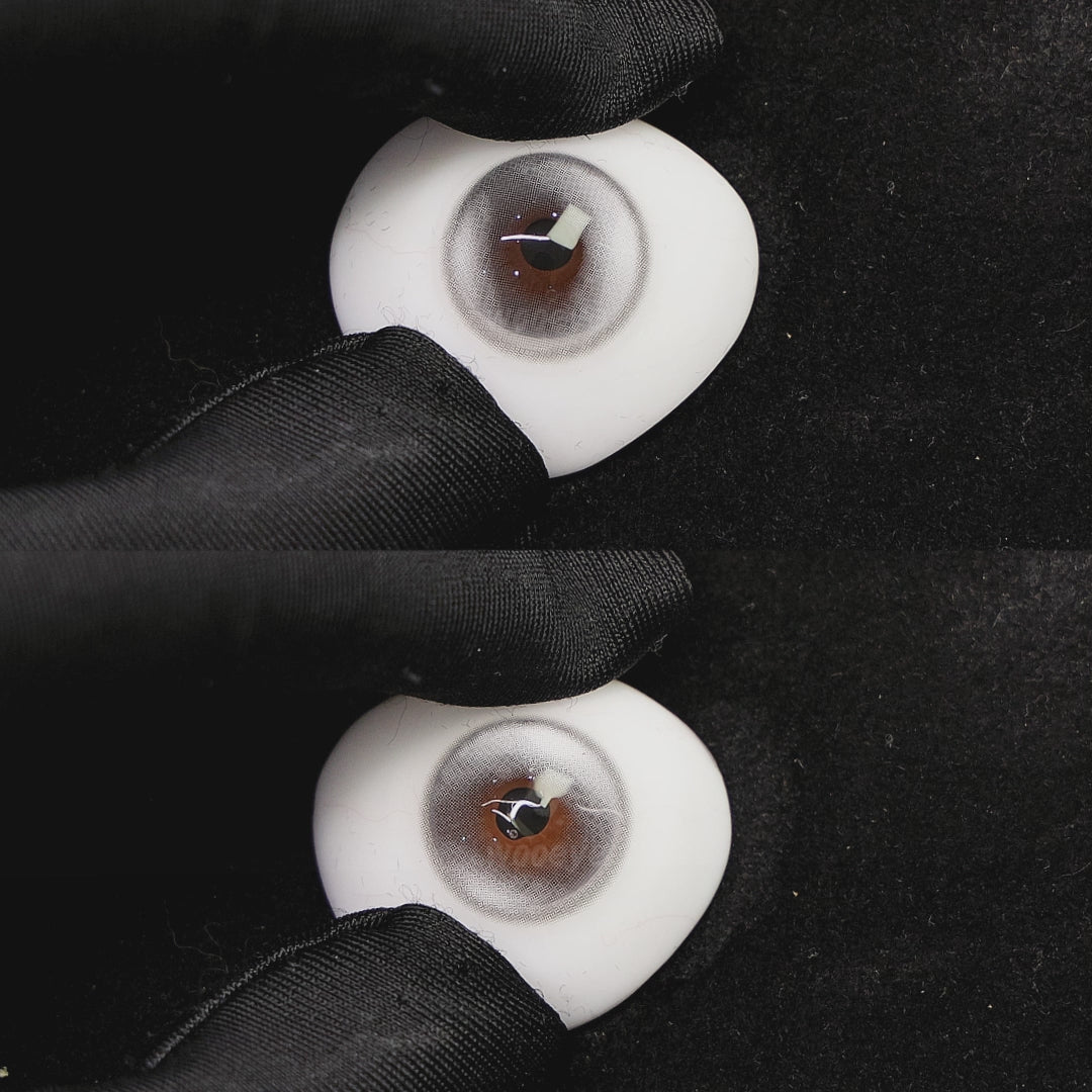 A simulated brown prosthetic eye showing the visual transformation effect of wearing halo pro silver colored contact lenses against a black background.