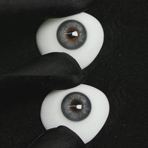 A simulated brown prosthetic eye showing the visual transformation effect of wearing Wooeye Frozen Blue colored contact lenses against a black background.