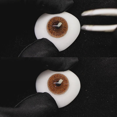 A simulated brown prosthetic eye showing the visual transformation effect of wearing coffee gray colored contact lenses against a black background.