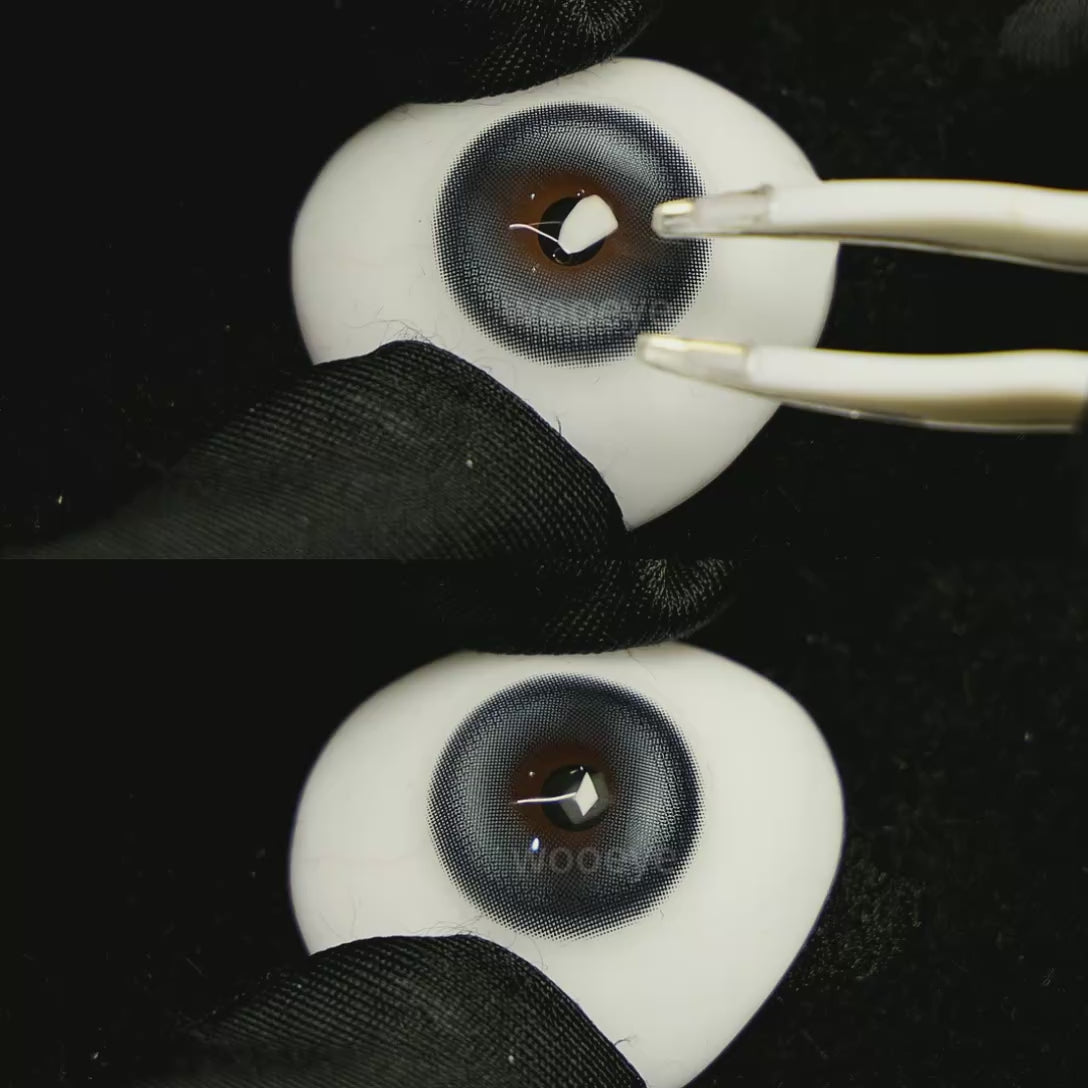 A simulated brown prosthetic eye showing the visual transformation effect of wearing Milk Galaxy Blue colored contact lenses against a black background.