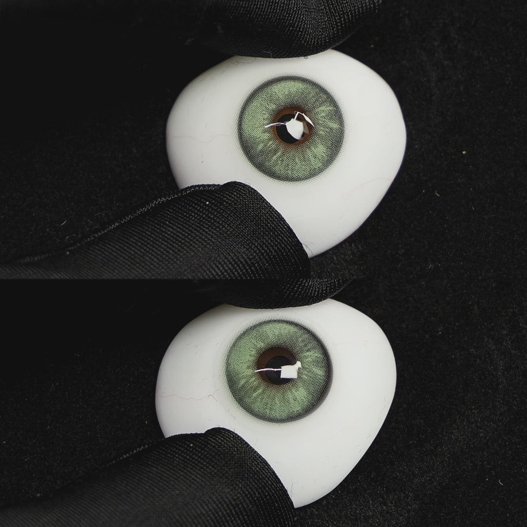 A simulated brown prosthetic eye showing the visual transformation effect of wearing Wooeye Frozen Green colored contact lenses against a black background.