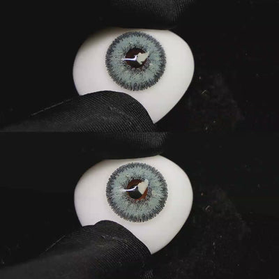 A simulated brown prosthetic eye showing the visual transformation effect of wearing Wooeye Galaxy Diamond blue colored contact lenses against a black background.