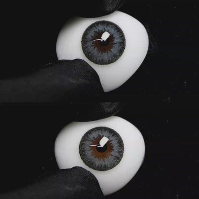 A simulated brown prosthetic eye showing the visual transformation effect of wearing Wooeye Queen Olive Green colored contact lenses against a black background.
